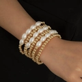 Elegante conjunto de pulseras multicapa con perlas blancas y cuentas doradas en la muñeca - Dorado (1878)