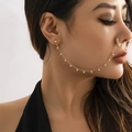 Detail of bohemian gold nose ring to ear chain with faux pearls on a female model - Artificial Pearl Tassel Gold (E3127)