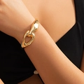 Bracciale a catena dorata stile punk con maglie metalliche geometriche intrecciate - Bangle / Oro