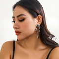 Avant-garde liquid metal earrings with irregular lava design in polished silver finish - Silver Toned Stud Earrings(3028)