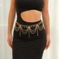 Detail of layered gold star waist chain jewelry on black dress with star pendants - 03 Gold 1577E3