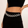 Silver body chain featuring hammered ring links styled on a model over black clothing - Silver