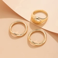 Dreiteiliges goldenes Lava-Ring-Set mit Siegelring und unregelmäßigen Wellen-Ringen - Dick Glatte Oberfläche Set