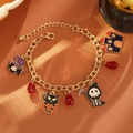 Dettaglio dei ciondoli smaltati di Halloween con gatto nero e cappello da strega - Stile Mietitore Zucca Oro (2477)