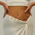 Golden double-layer waist chain with starfish, seashell, and palm tree charms on a model - Bead Chain and Ocean Charms Combo / Gold (6249)