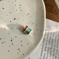 Detail of a cylindrical rainbow enamel bead with colorful stripes on a ceramic plate - Pendant Only (Without Chain) (DZ0017)