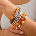Close-up of fall-themed Heishi bead bracelets with Thanksgiving turkey and pumpkin charms - FALL-THANKSGIV Maple Leaf Pendant Style (5544)