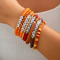 Close-up of stacked Thanksgiving bracelets with turkey and pumpkin letter beads - FALL-TURKEY-GOBBLE-PUMPKIN Style (5545)