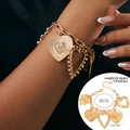 Golden multi-charm heart link bracelet with textured pendants and lobster clasp - Bracelet-Gold (2925)