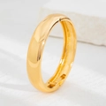 Minimalist metallic gold open-hinge bracelet with a glossy polished spring finish - Gold Arc Style (2441)