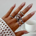 Silver fashion ring set with pink and purple gemstones worn by model in cafe setting - 6010 Style (6010) / Silver