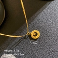 Golden woven round pendant necklace with dimensions 1.5cm diameter and 40+5.5cm chain length - Circular Dreamcatcher