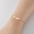 Elegante pulsera de mujer en acero inoxidable dorado con un delicado colgante de zorro - Zorro Dorado