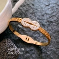 Rose gold Mobius bangle with cubic zirconia infinity design and open mechanism - Full Zirconia Mobius Bangle / Rose Gold