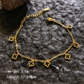 Goldene Armkette mit sieben schwarzen Kleeblatt-Anhängern und detaillierten Größenangaben - Hohl Vierblättriges Kleeblatt Armband / Gold Hohl Kleeblatt Armband