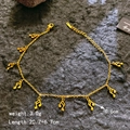 Elegantes goldenes Musiknoten-Armband mit verstellbarem Verschluss auf schwarzem Stein - Gold Musiknote Fußkettchen