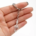 Portachiavi con gesto del dito in acciaio inossidabile argento con elemento decorativo - Stile Gesto del Dito Medio (078)