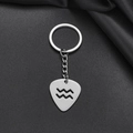 Macro detail of silver stainless steel Aquarius zodiac guitar pick keychain pendant - Aquarius (011)