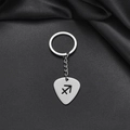 Detailed close-up of a silver stainless steel guitar pick keychain with Sagittarius cutout - Sagittarius (009)