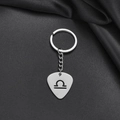 Polished stainless steel Libra zodiac keychain with guitar pick shape on black fabric - Libra (007)