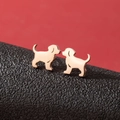 Cute minimalist puppy stud earrings in polished gold finish with a sleek mirror surface - Standing Dog Shape (786 Rose Gold)