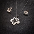 Parure de bijoux minimaliste en acier inoxydable avec collier et boucles fleurs d'hibiscus - Acier