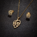 Golden stainless steel jewelry set featuring hollow monstera leaf pendant and earrings - Hollow Monstera Leaf Style (153 Gold)