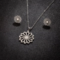Silver stainless steel jewelry set featuring hollow sunflower pendant and matching studs - Hollow Sunflower Style (154 Steel Color)