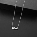Detalle del colgante plateado del signo Libra en una cadena fina de estilo elegante - Libra / Plateado