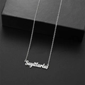 Collar con colgante del zodiaco Sagitario minimalista en plata sobre caja de regalo negra - Sagitario / Plateado