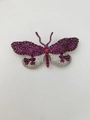 Macro shot of butterfly brooch with purple and white gemstones on black metal plating - Purple Red And White Butterfly (03)