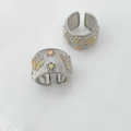 Detailed macro of wide silver-toned rings with brushed finish and colorful butterfly gems - Butterfly Floral Adjustable Ring / Silver Ring