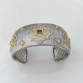 Brushed silver cuff bracelet with gold floral accents and a central blue gemstone - Bracelet White-Blue