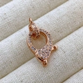 Macro shot of a rose gold lobster clasp with micro pavé set cubic zirconia stones - L3 Style (Small) / Rose Gold