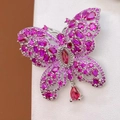 Elegante vlinderbroche met paarse zirkoon en hangende steen in peervormige slijpvorm - Roze Paars