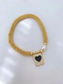 Golden beaded stretch bracelet with white pearl and black diamond heart charm - Black Heart Style (款式6)