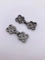 Dettaglio di fermagli a farfalla in oro 18K con zirconi per creazioni di gioielli fai da te - 08-Stile Infinito/Nodo Ruyi / Nero