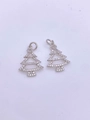 Detailed close-up of sparkling silver Christmas tree pendants with pave cubic zirconia - Openwork Zirconia Christmas Tree Pendant / White Gold