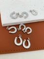 Detailed view of eight horseshoe pendants with silver plating and mother of pearl inlay - Horseshoe Style (5840107383772) / Pendant 04 - Platinum Color