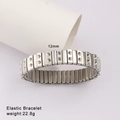 Detail view of 12mm silver stainless steel elastic bracelet with embossed textured segments - Silver Color Double Hole Style (Style 45)