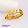 Close-up of a 12mm wide gold elastic stainless steel bracelet with embossed sphere design - Bright Gold Ball Decoration (Style 81)