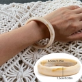 Irregular acrylic resin bangle in pale yellow with cloud texture and glossy finish - Wide Marble Pattern Bangle (2929) / Off White