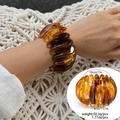 Bracelet vintage en résine ambrée avec finition marbrée translucide et lien élastique - Style Élastique Ondulé (2939) / Circonférence 18cm / Ambre