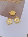 Detailed macro view of square gold pendants with heart motifs and lava texture finish - Heart - Gold (Pendant Only (Without Chain))