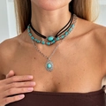 Three-layer bohemian turquoise bead necklace with vintage silver pendant on female model - Vintage Silver Oval Turquoise Style (6721)