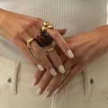Golden stackable ring set featuring a wide brown resin stone ring and metal bands - Gold Style (6906)