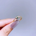 Luxurious gold snake ring with sparkling white cubic zirconia and green gemstone eyes - Gold Snake Style