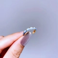Close-up of adjustable gold ring with light blue enamel and 3D star pattern detail - Gold Light Blue Star Style
