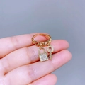 Elegant gold adjustable ring with cubic zirconia encrusted lock and key pendants - Gold Key and Lock Style