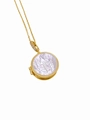 Macro shot of 18K gold plated necklace with shell religious pendant and pavé zircon clasp - St. Benedict Religious Relief Style (Necklace D)